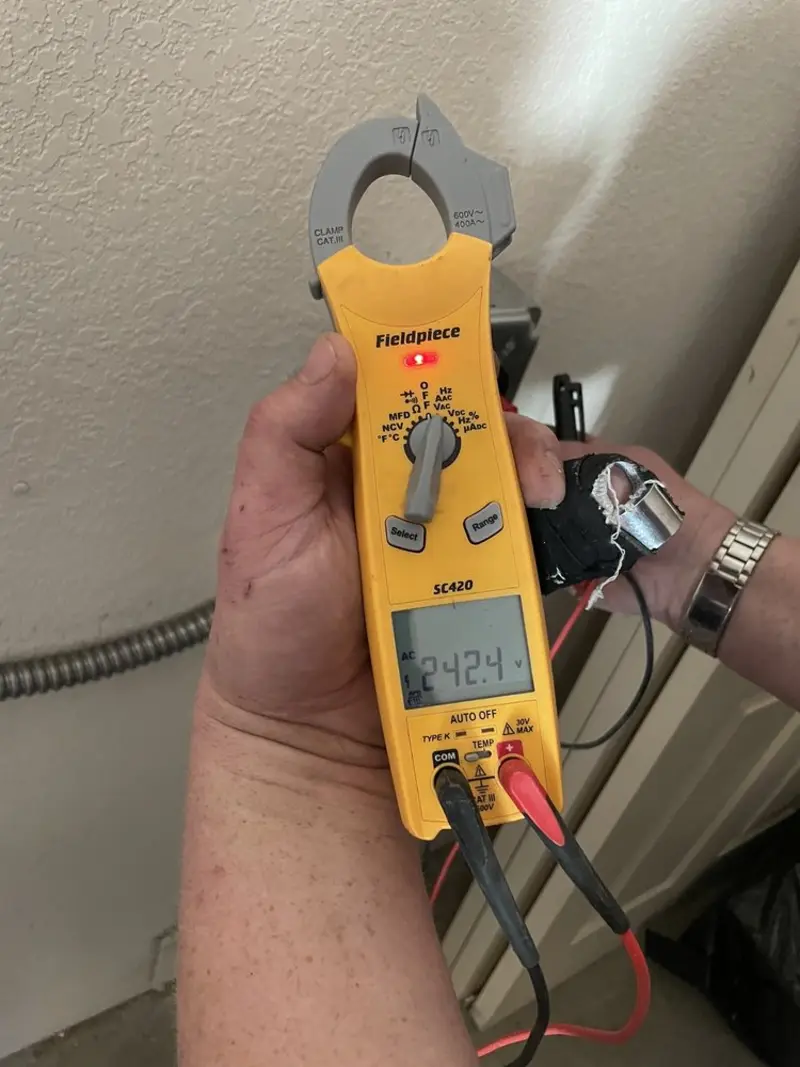Voltage testing with clamp meter during Generator Installation in Lancaster
